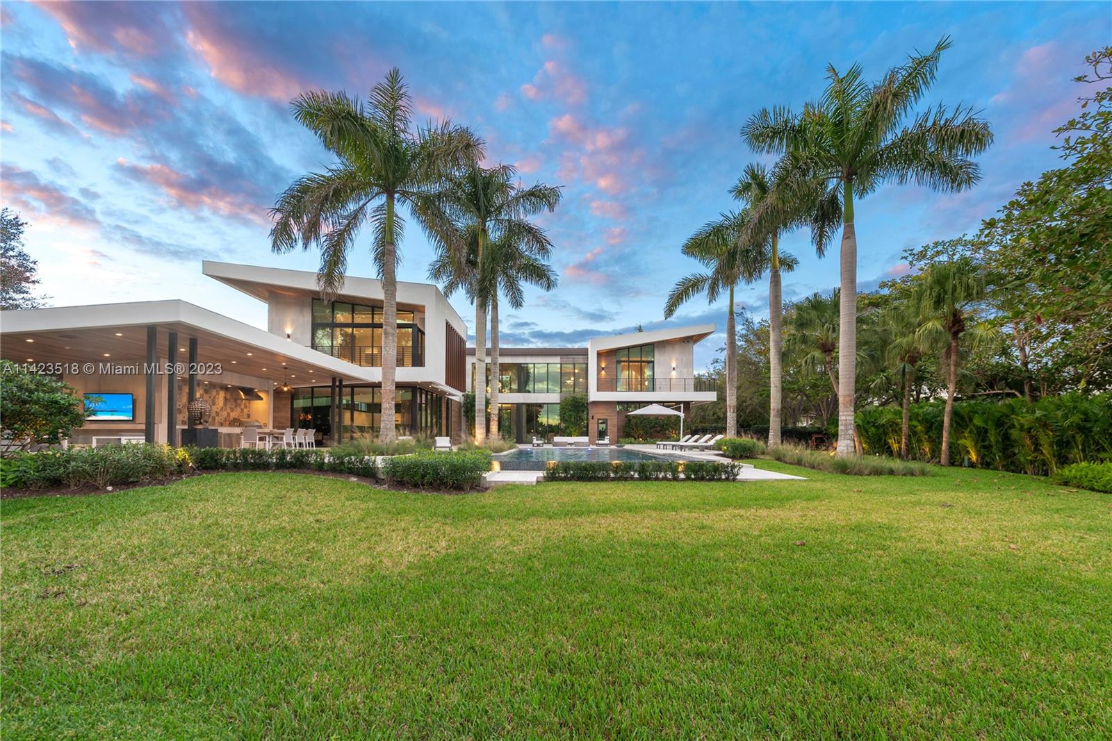 2690 Hackney Road Weston, FL 33331 - Photo 71 of 88 a view of a house with a big yard and palm trees
