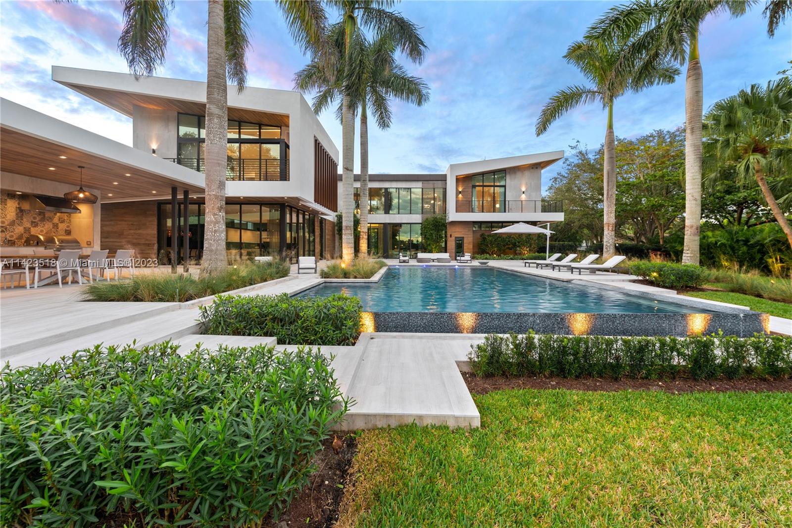 2690 Hackney Road Weston, FL 33331 - Photo 72 of 88 a front view of a house with garden