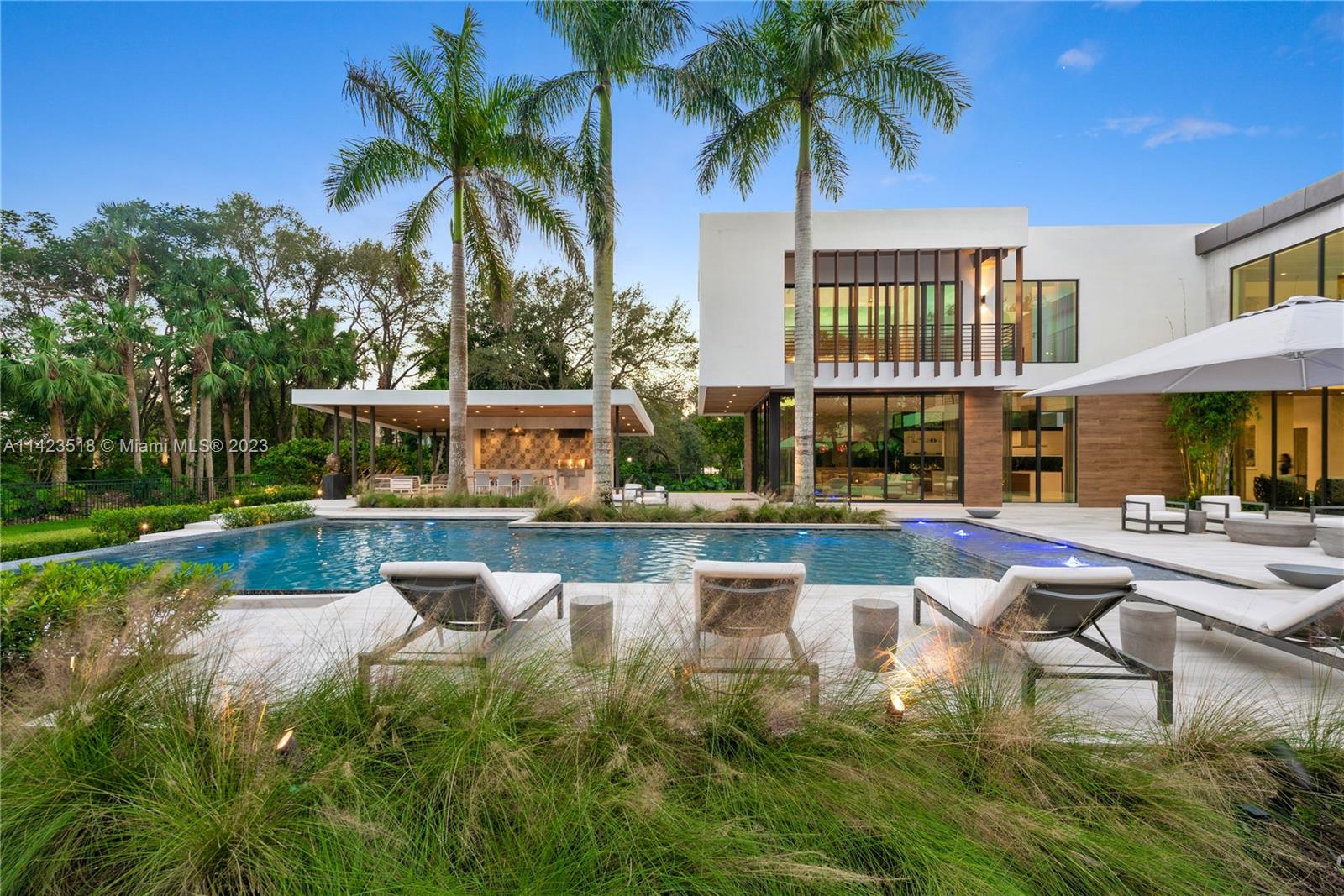 2690 Hackney Road Weston, FL 33331 - Photo 74 of 88 a view of a house with swimming pool and sitting area