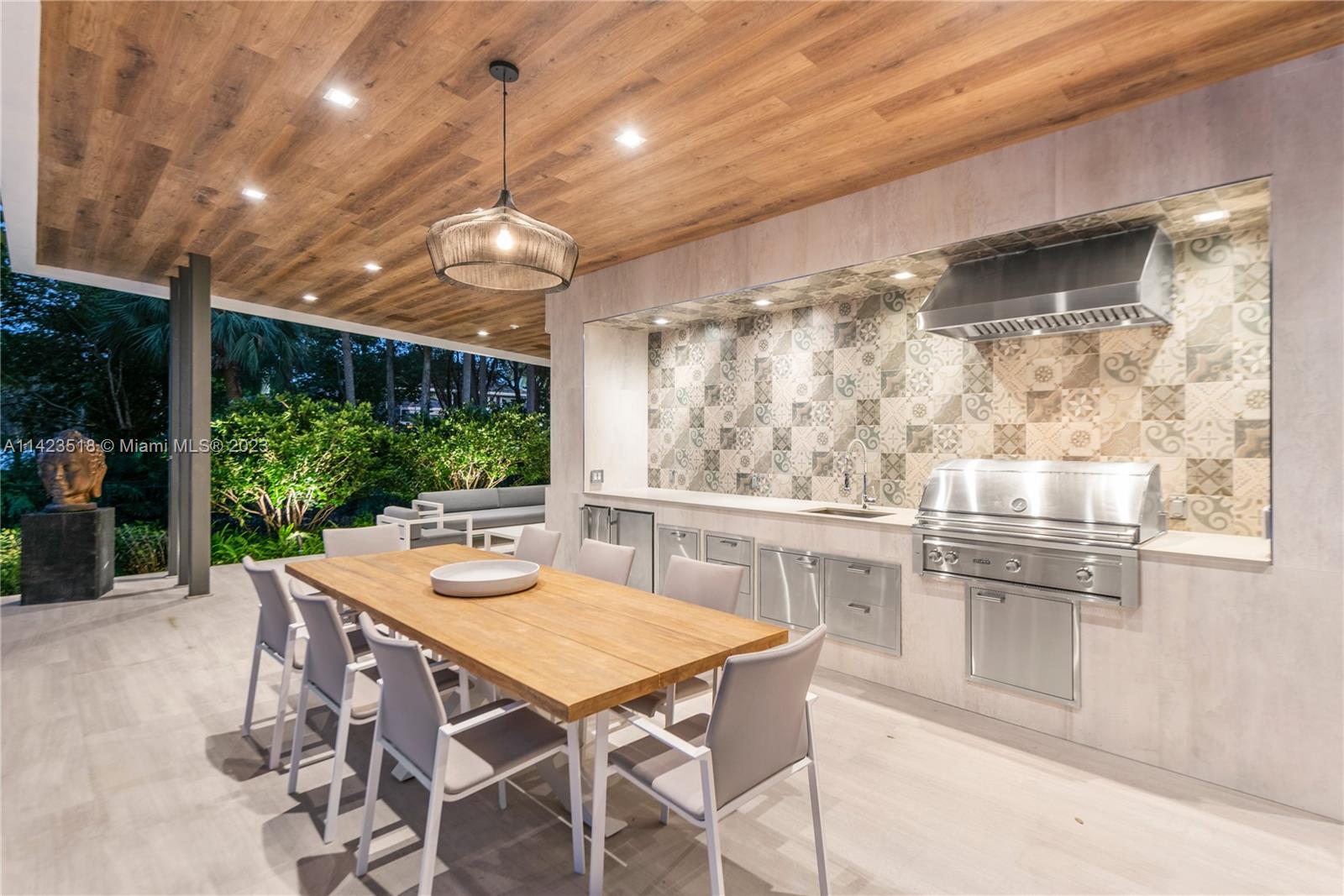 2690 Hackney Road Weston, FL 33331 - Photo 76 of 88 a view of a dining room with furniture window and outside view