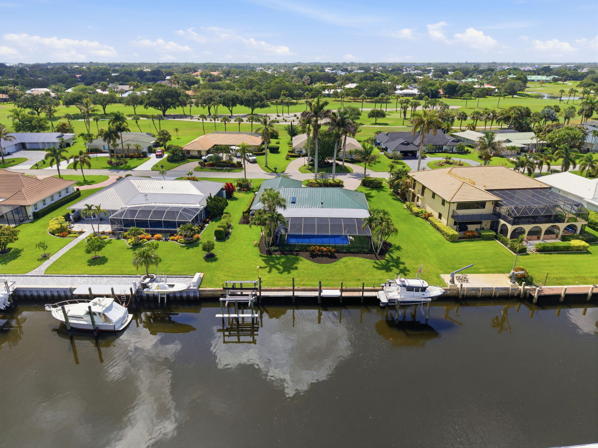 3374 Southeast Fairway East Stuart, FL 34997 - Photo 41 of 65 an aerial view of residential houses with outdoor space
