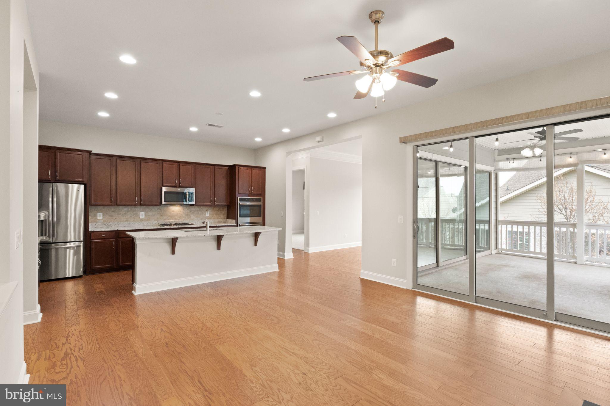 103 Cloak Lane White Post, VA 22663 - Photo 31 of 98 a large white kitchen with a large window and stainless steel appliances