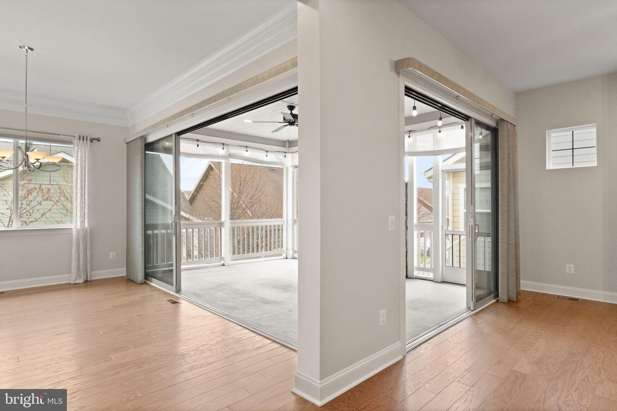 103 Cloak Lane White Post, VA 22663 - Photo 35 of 98 an empty room with wooden floor and windows