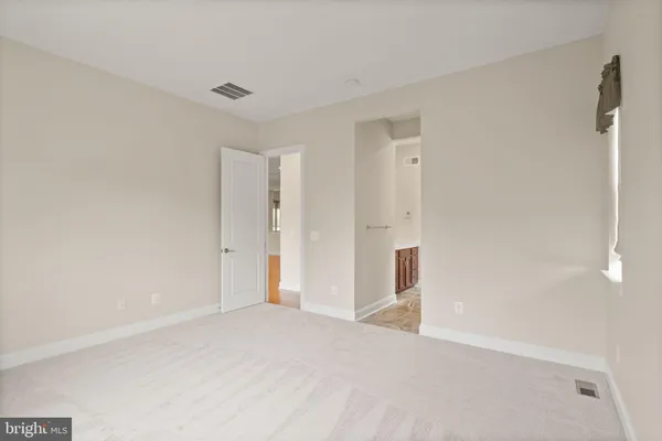 a view of a room with lots of dining room and wooden floor