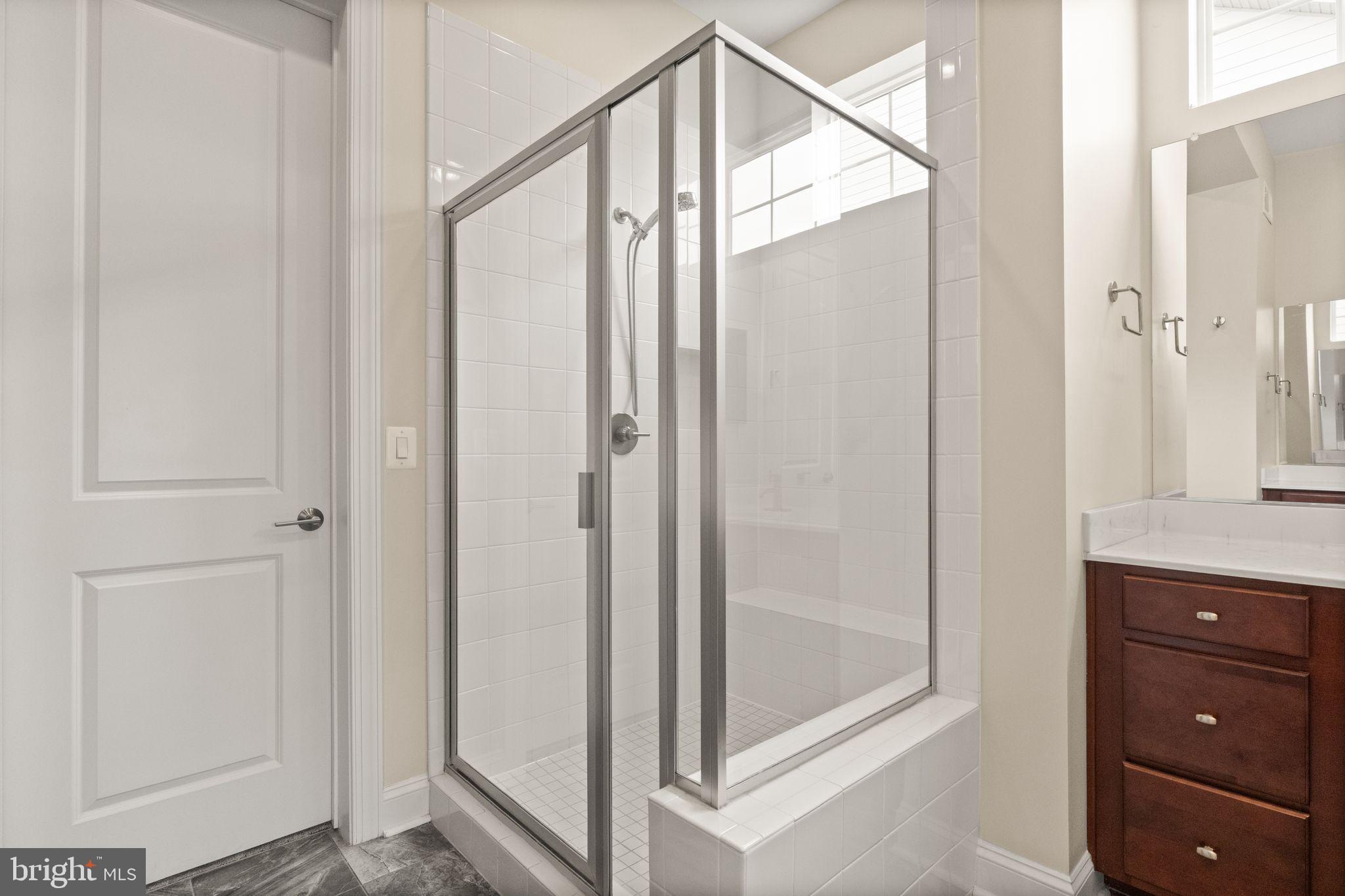 103 Cloak Lane White Post, VA 22663 - Photo 50 of 98 a bathroom with a glass shower door and a sink