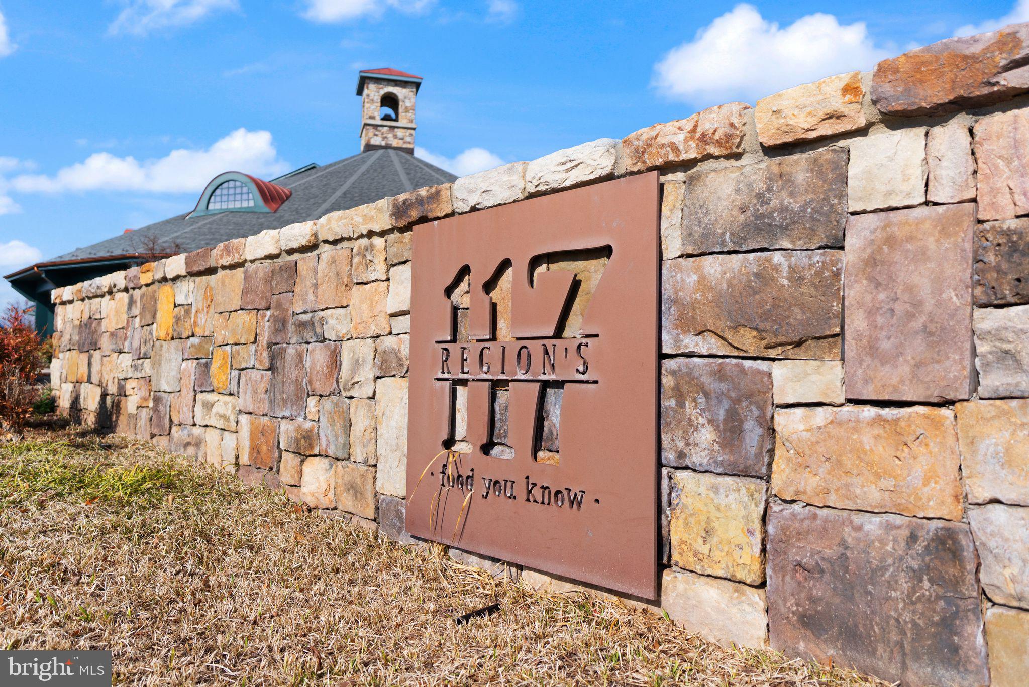 103 Cloak Lane White Post, VA 22663 - Photo 82 of 98 a street sign on a street next to a building