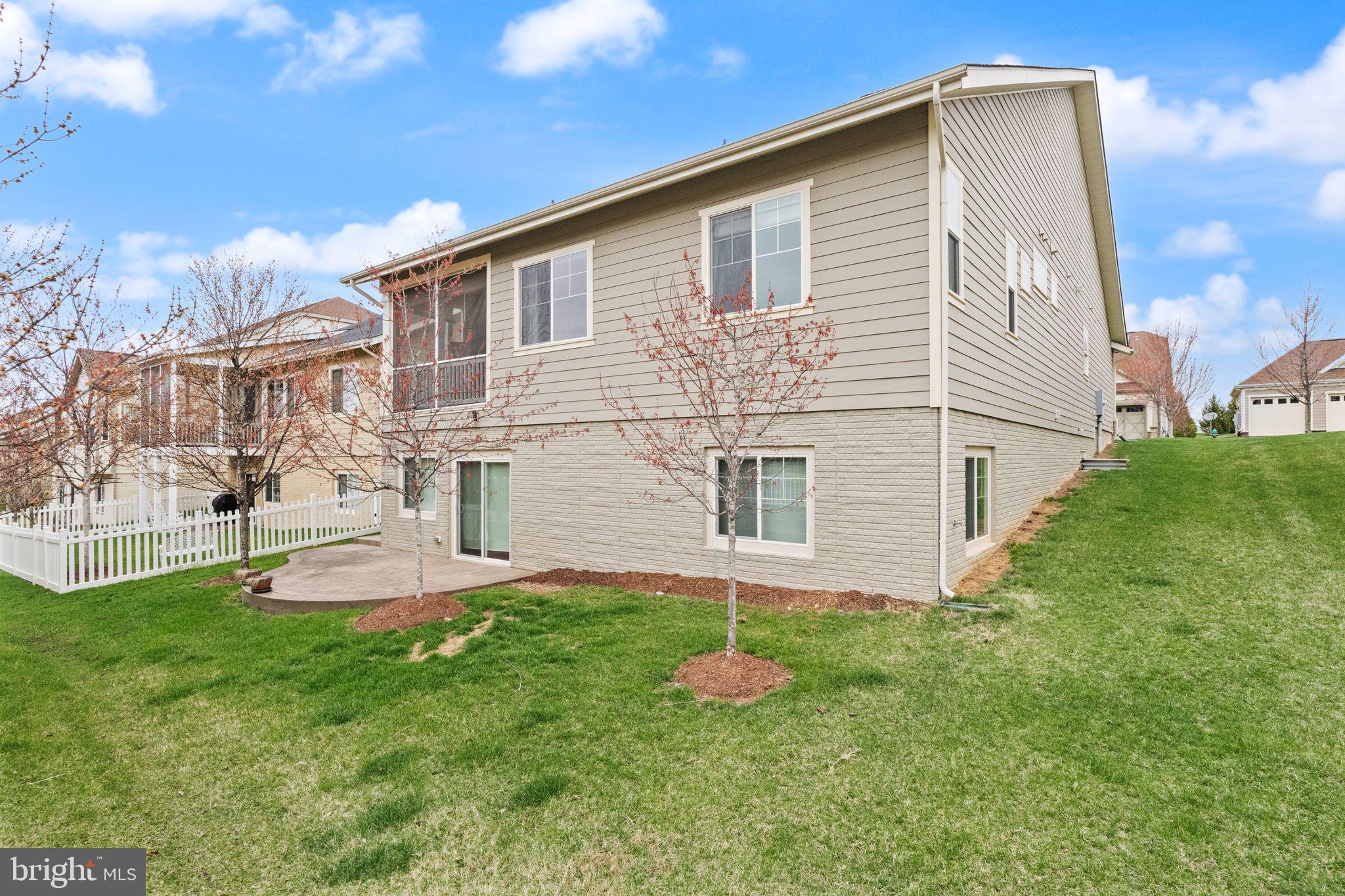 103 Cloak Lane White Post, VA 22663 - Photo 95 of 98 a front view of a house with a yard and garage