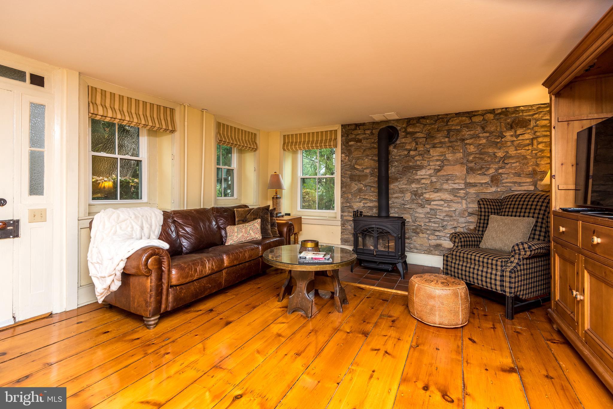 3264 Durham Road Doylestown, PA 18902 - Photo 15 of 37 Living room with exposed stone wall