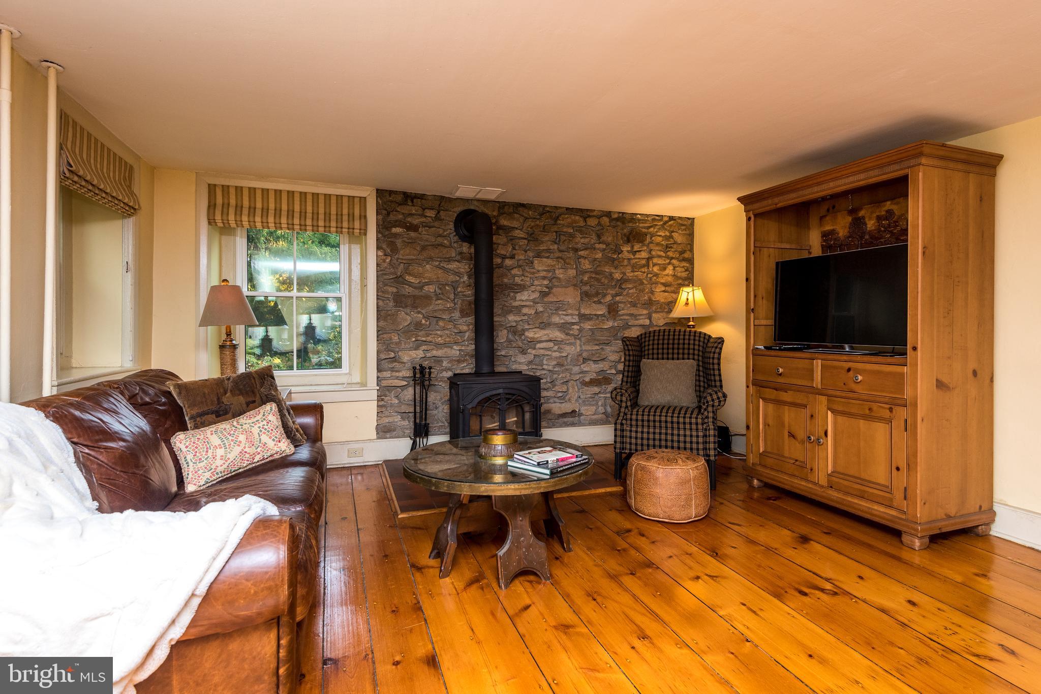 3264 Durham Road Doylestown, PA 18902 - Photo 16 of 37 Living room with wood burning stove