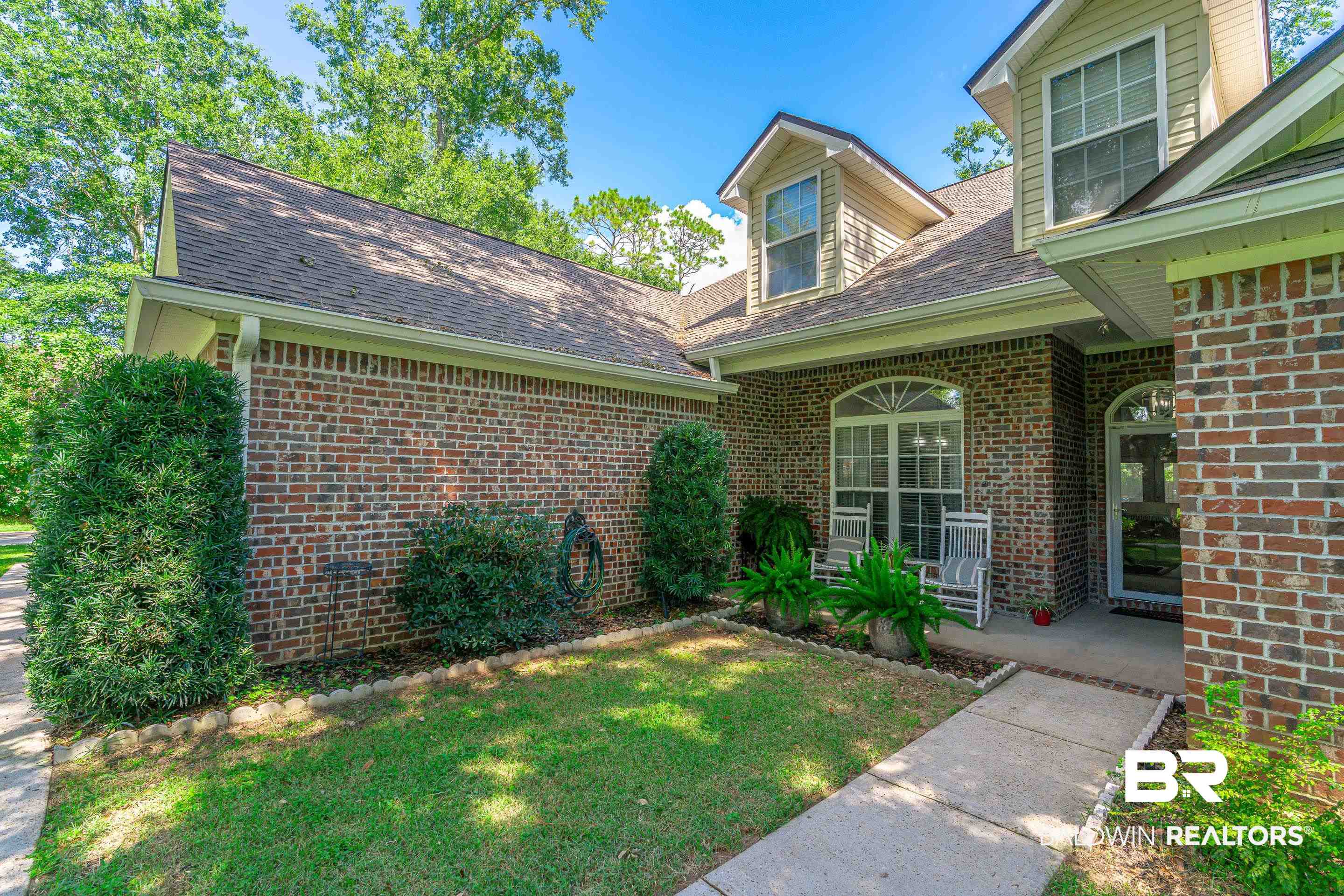 302 Bristol Way Foley, AL 36535 - Photo 48 of 51 Exterior space with a front lawn