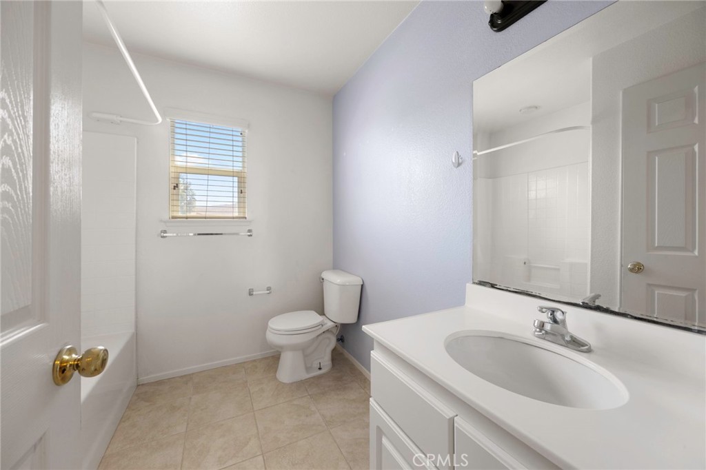 151 Ropango Way Hemet, CA 92545 - Photo 16 of 28 a bathroom with a sink and a toilet