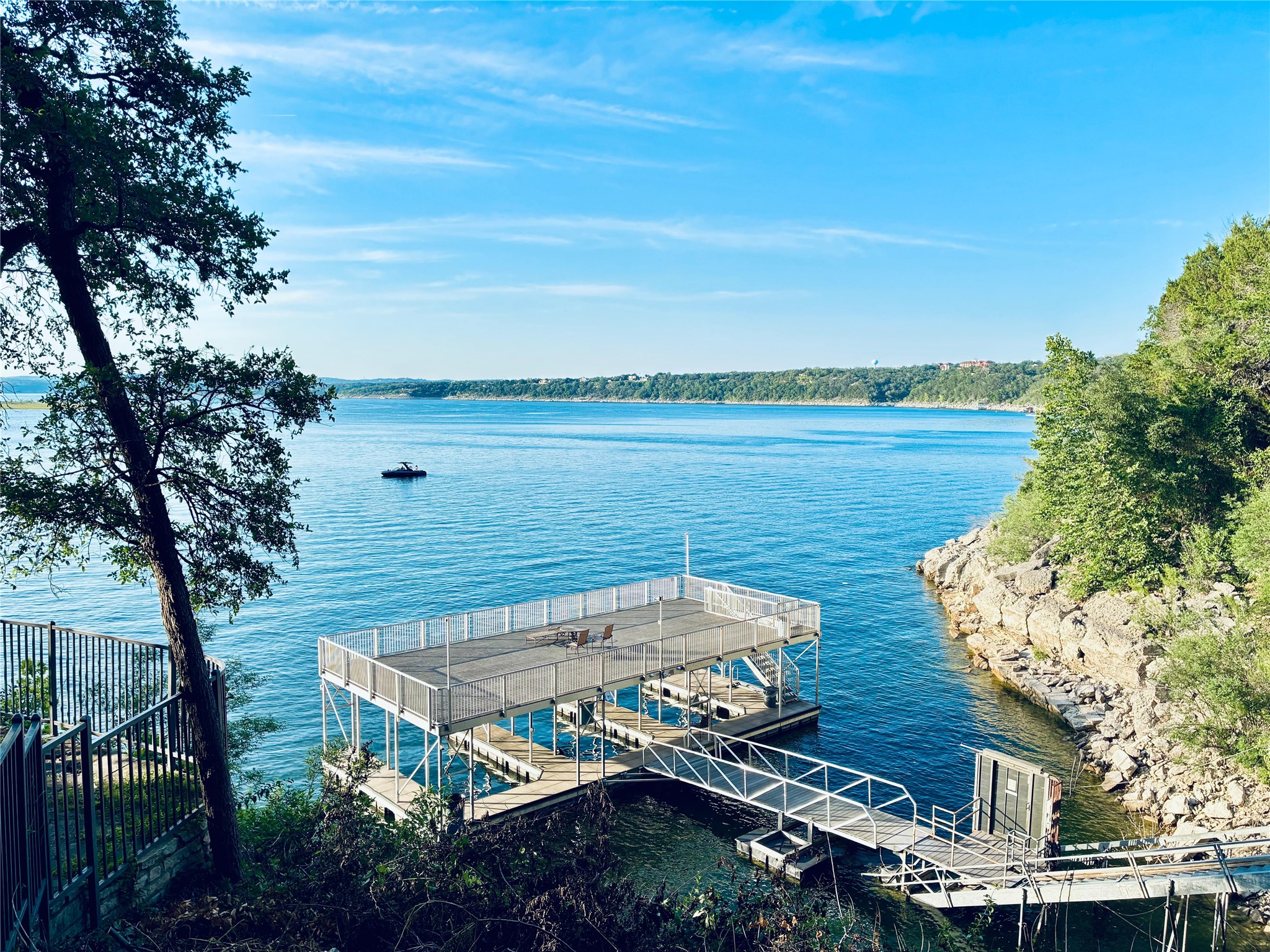 2918 Ranch Road 620, Unit 172 Austin, TX 78734 - Photo 20 of 20 a view of a lake with a mountain view