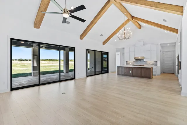 a view of a room with cabinet and windows