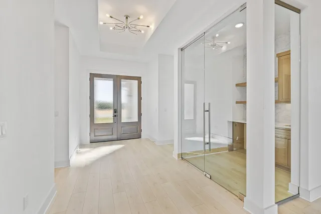 a view of a bathroom with a shower and closet