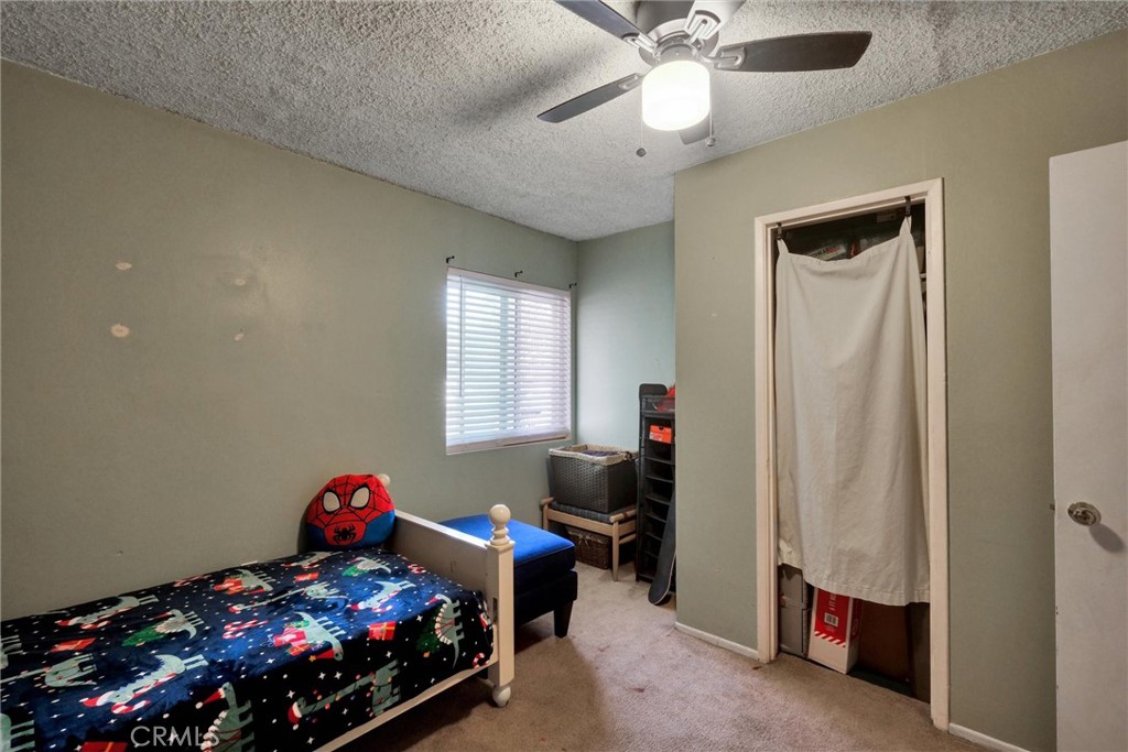 2435 Burkett Road El Monte, CA 91732 - Photo 14 of 52 a bed room with a bed and a window