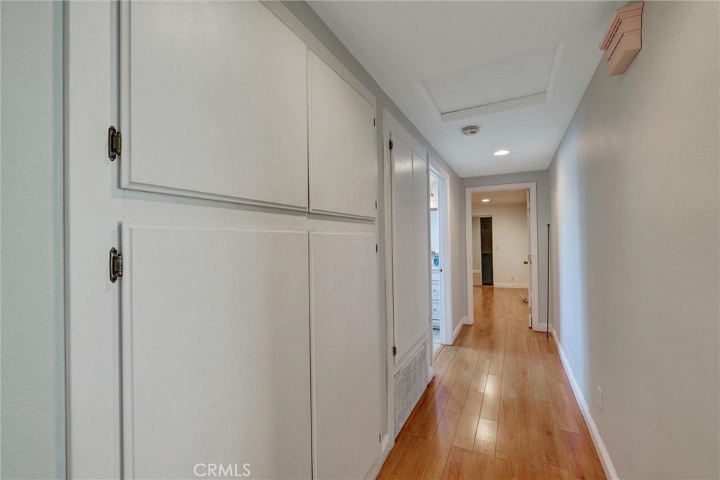 2435 Burkett Road El Monte, CA 91732 - Photo 32 of 52 a view of a hallway with wooden floor