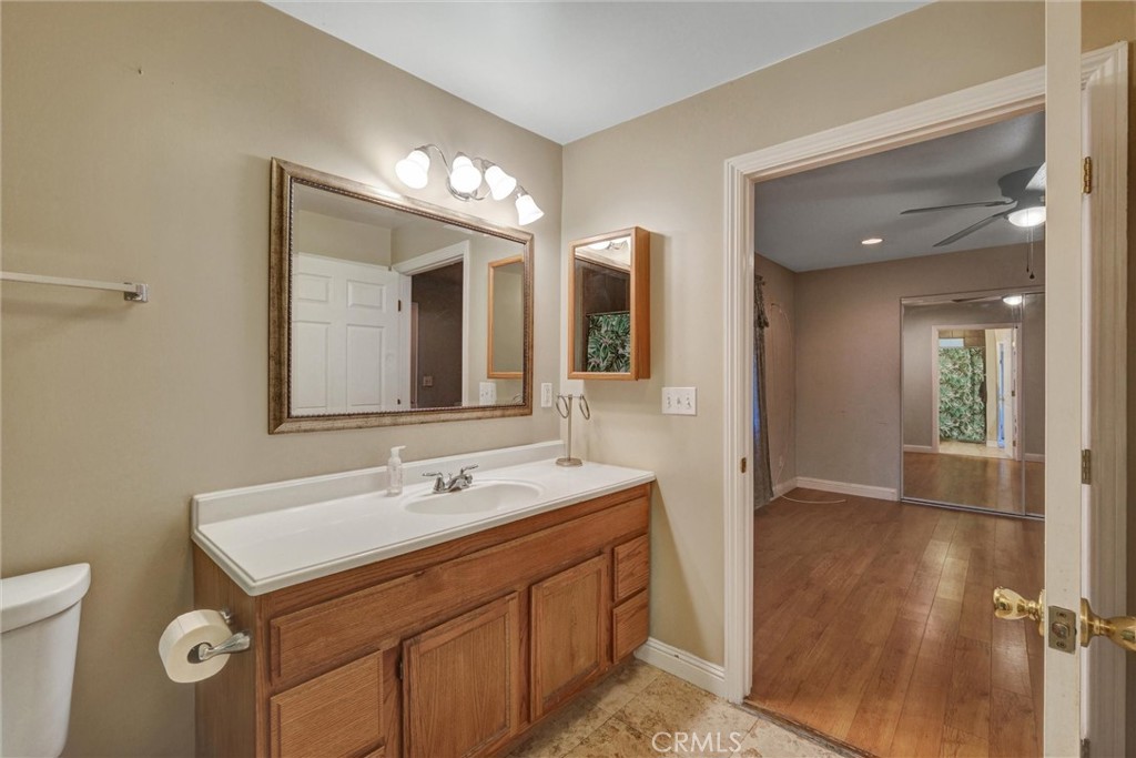2435 Burkett Road El Monte, CA 91732 - Photo 34 of 52 a bathroom with a sink and a mirror