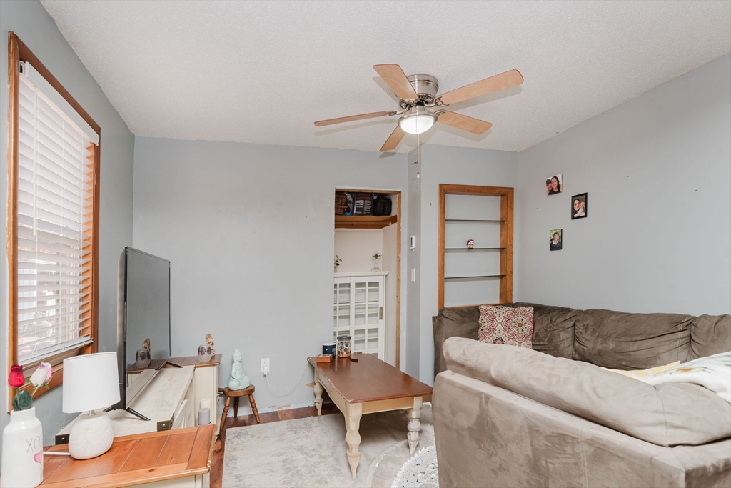 108 Lower Gore Road Webster, MA 01570 - Photo 14 of 39 a living room with furniture and a large window