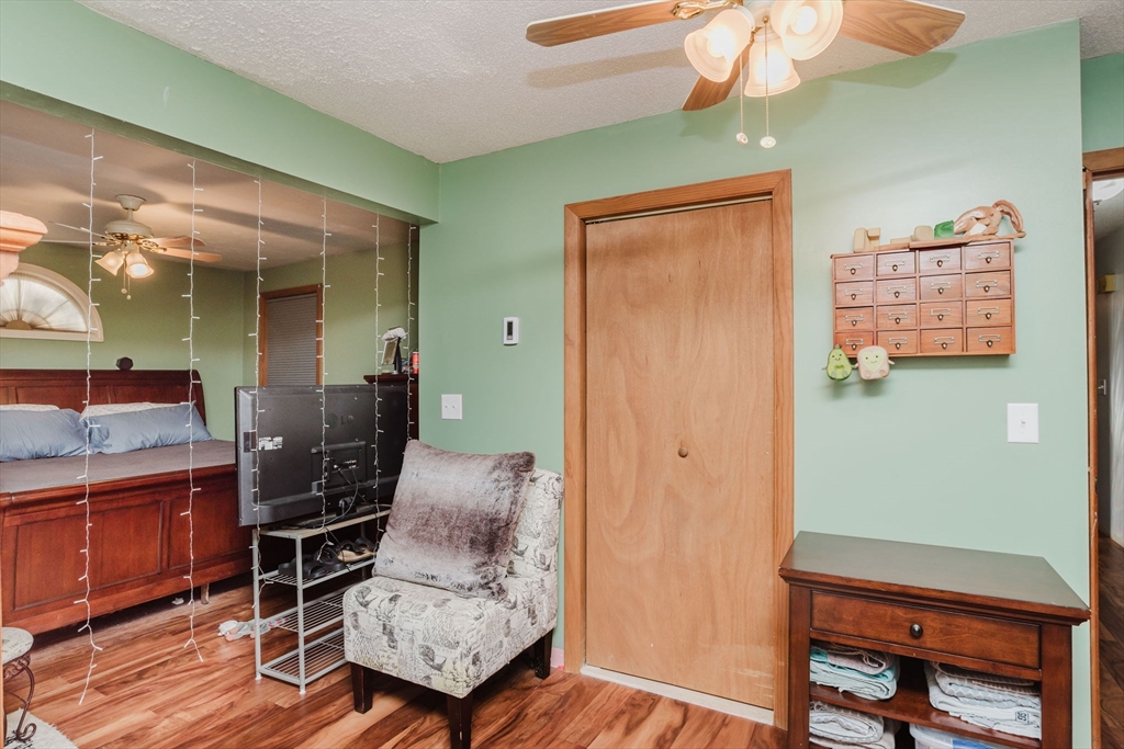 108 Lower Gore Road Webster, MA 01570 - Photo 21 of 39 a living room with furniture and a window