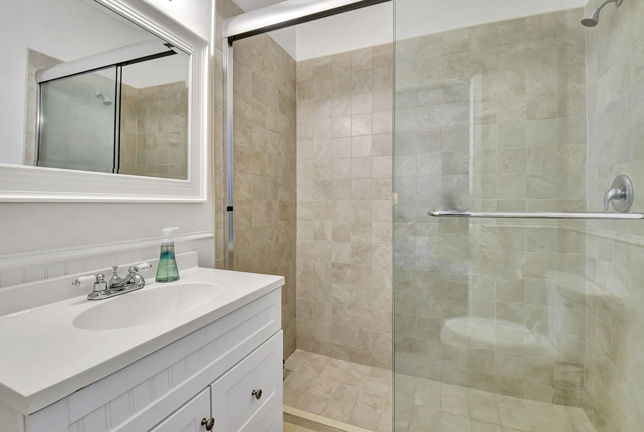6623 Northwest 25th Avenue Boca Raton, FL 33496 - Photo 21 of 37 a bathroom with a sink and a mirror