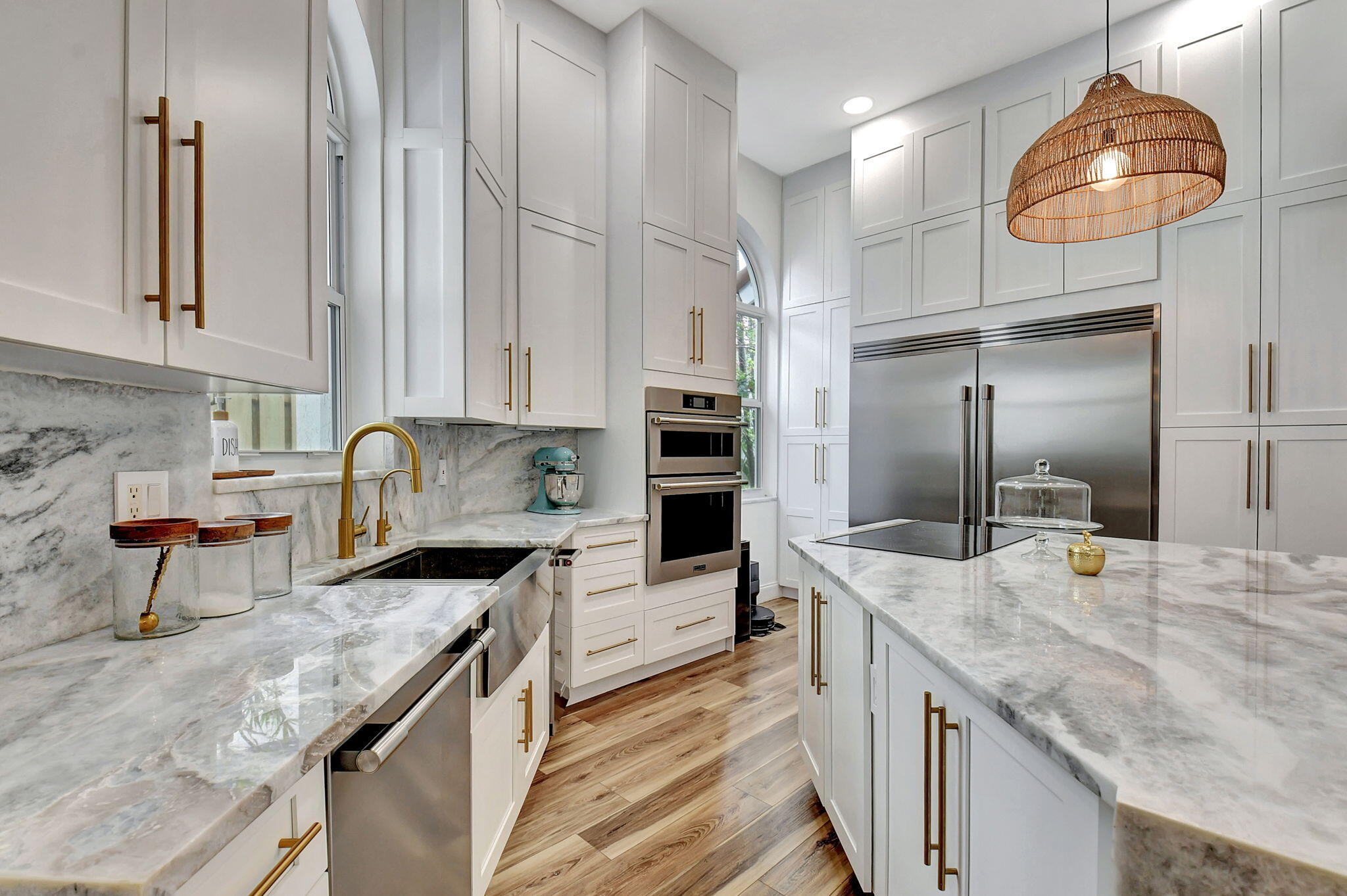 6623 Northwest 25th Avenue Boca Raton, FL 33496 - Photo 5 of 37 a kitchen with stainless steel appliances granite countertop a sink and stove