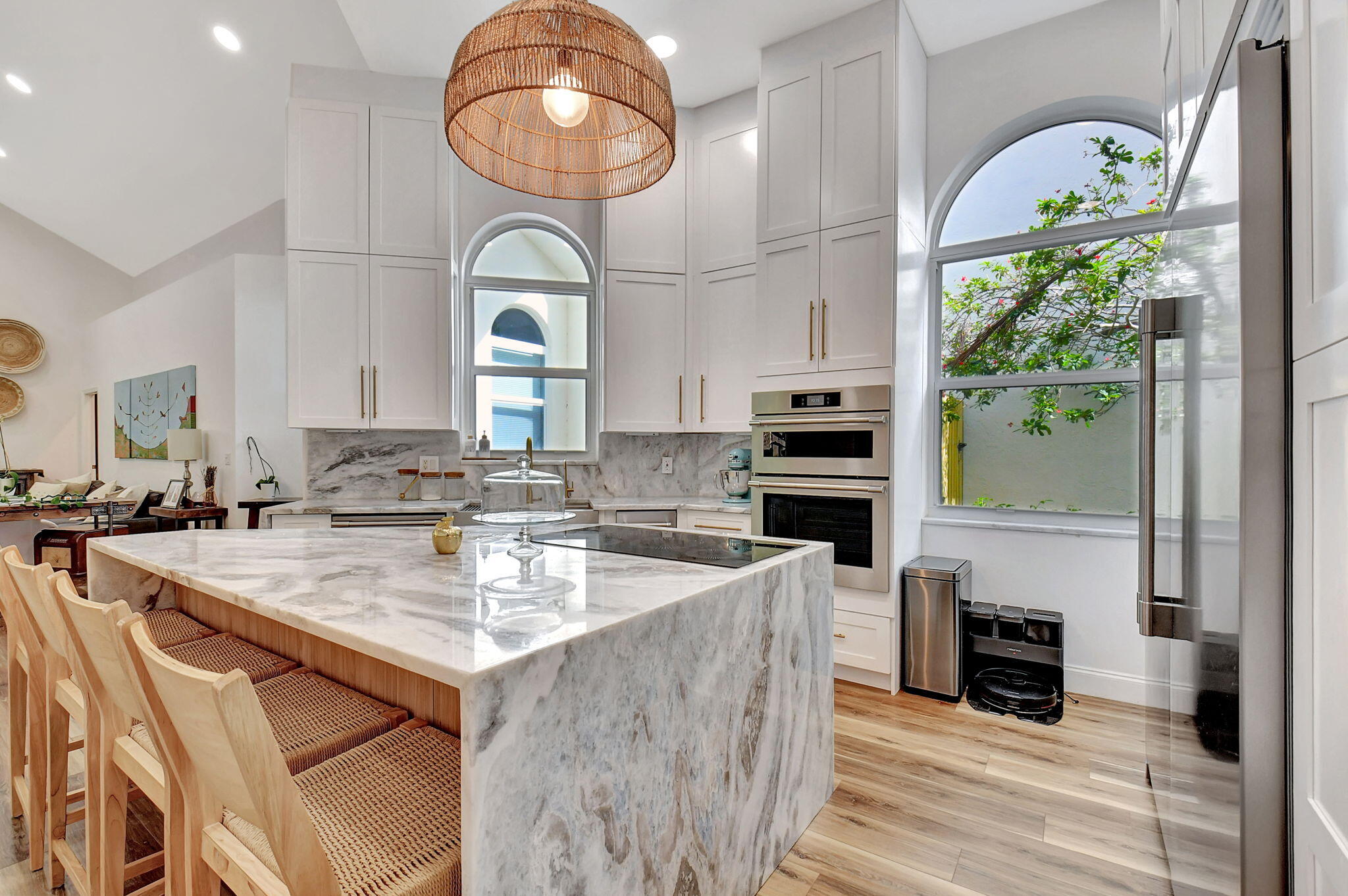 6623 Northwest 25th Avenue Boca Raton, FL 33496 - Photo 7 of 37 a large kitchen with stainless steel appliances granite countertop a stove and a sink