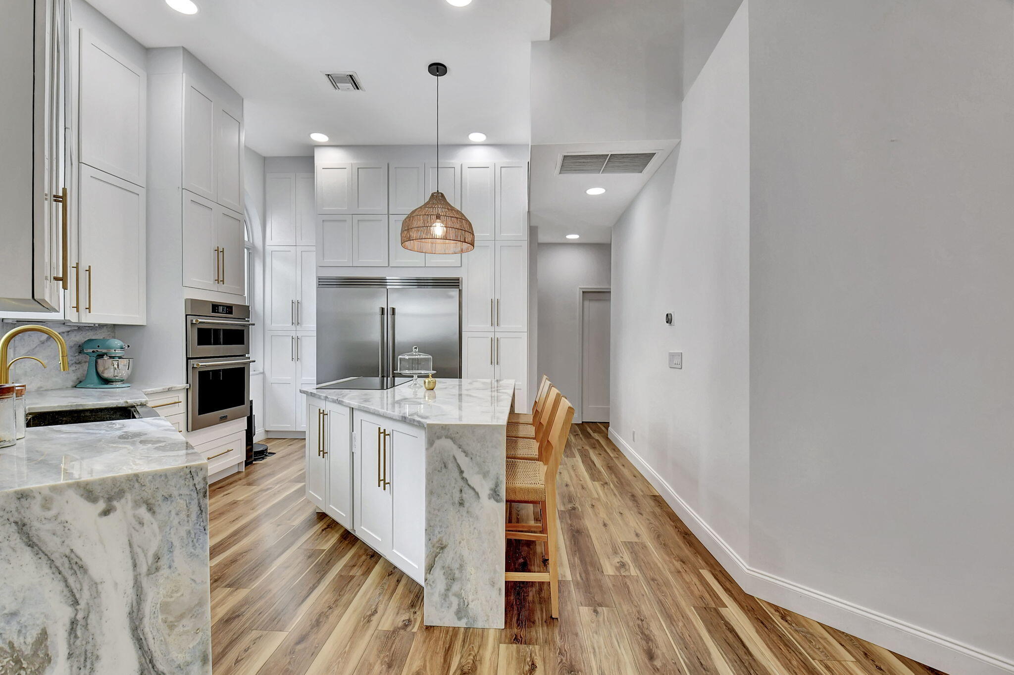 6623 Northwest 25th Avenue Boca Raton, FL 33496 - Photo 9 of 37 a kitchen with stainless steel appliances granite countertop a stove and cabinets