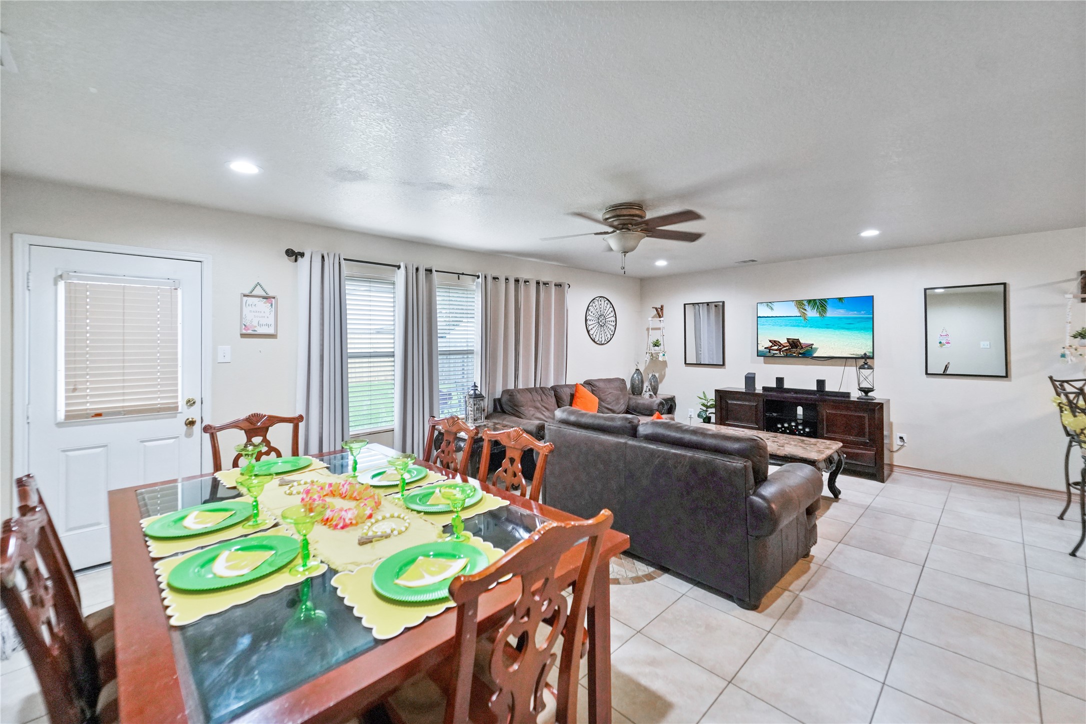 8011 Sumal Circle Baytown, TX 77521 - Photo 13 of 37 a living room with furniture and a flat screen tv