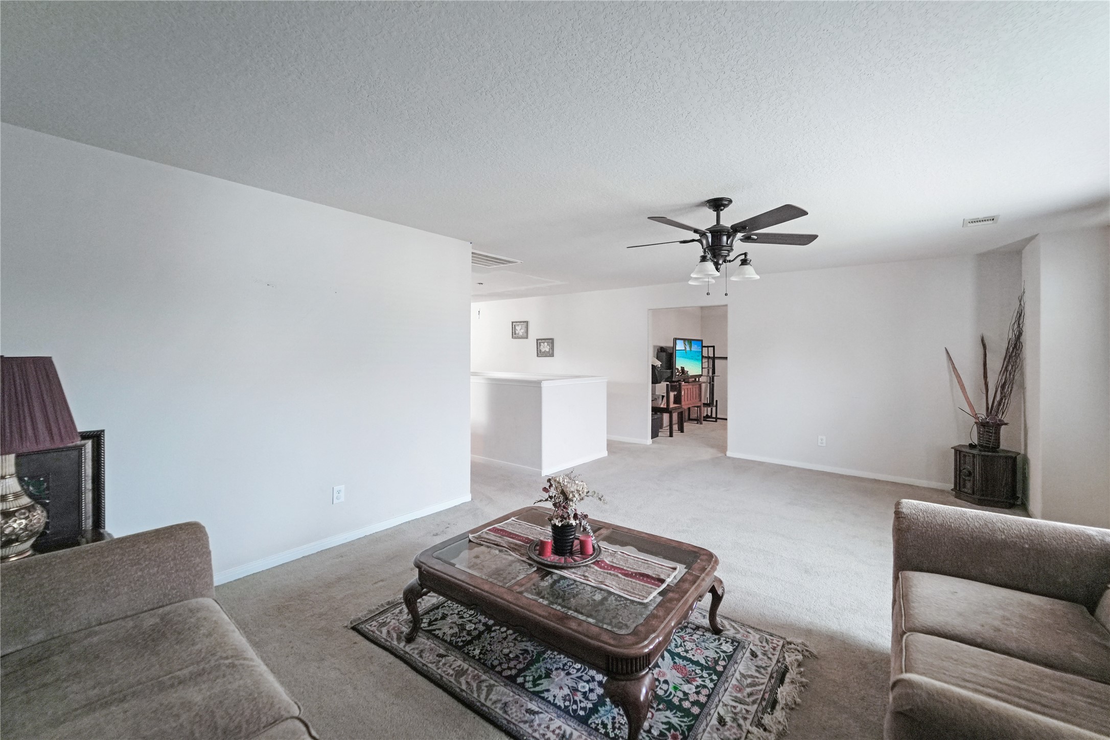 8011 Sumal Circle Baytown, TX 77521 - Photo 20 of 37 a living room with furniture and a view of kitchen