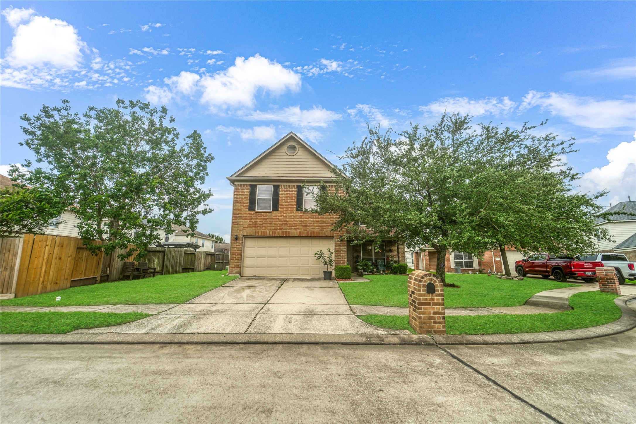 8011 Sumal Circle Baytown, TX 77521 - Photo 2 of 37 a front view of a house with a yard and potted plants