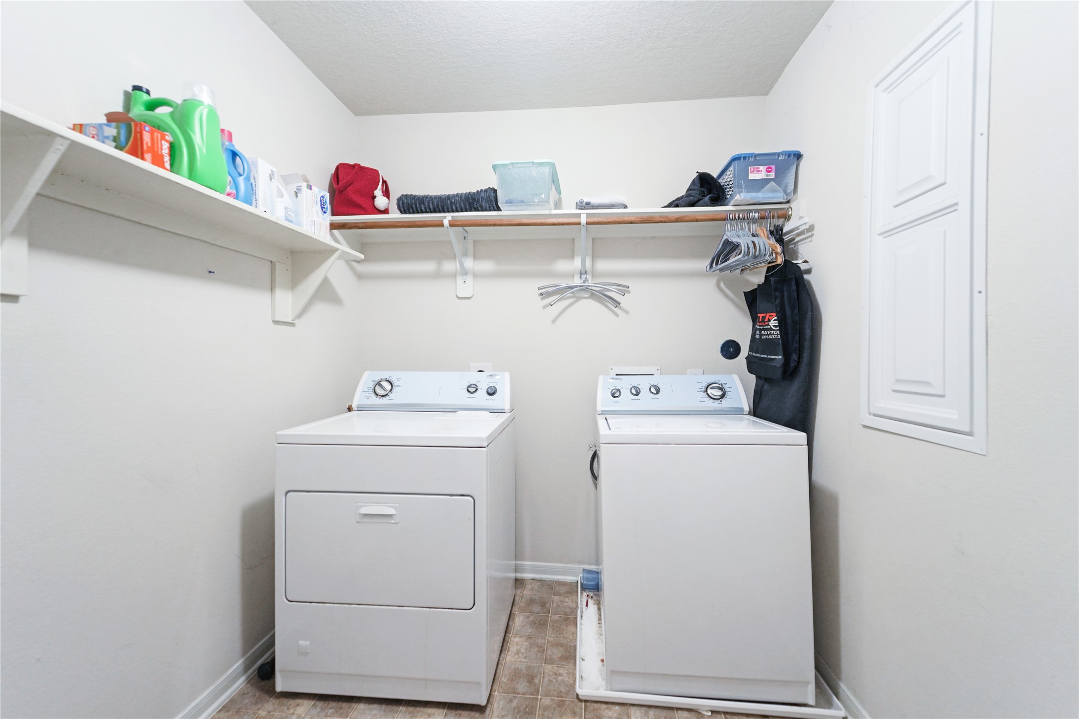 8011 Sumal Circle Baytown, TX 77521 - Photo 23 of 37 a utility room with dryer and washer