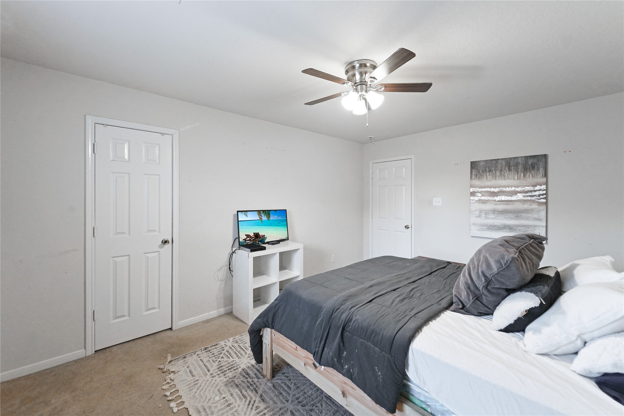 8011 Sumal Circle Baytown, TX 77521 - Photo 25 of 37 a bedroom with a bed and closet