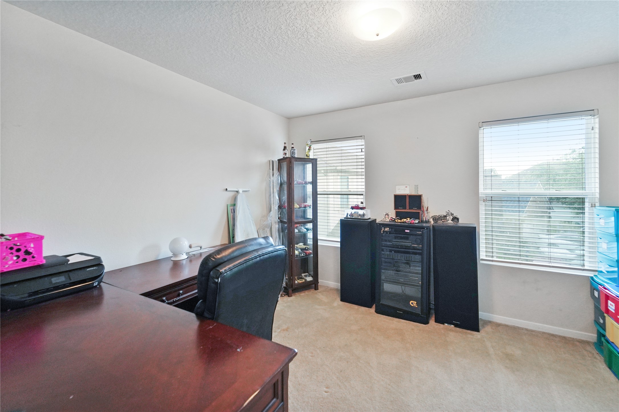 8011 Sumal Circle Baytown, TX 77521 - Photo 34 of 37 a bedroom with a bed and furniture