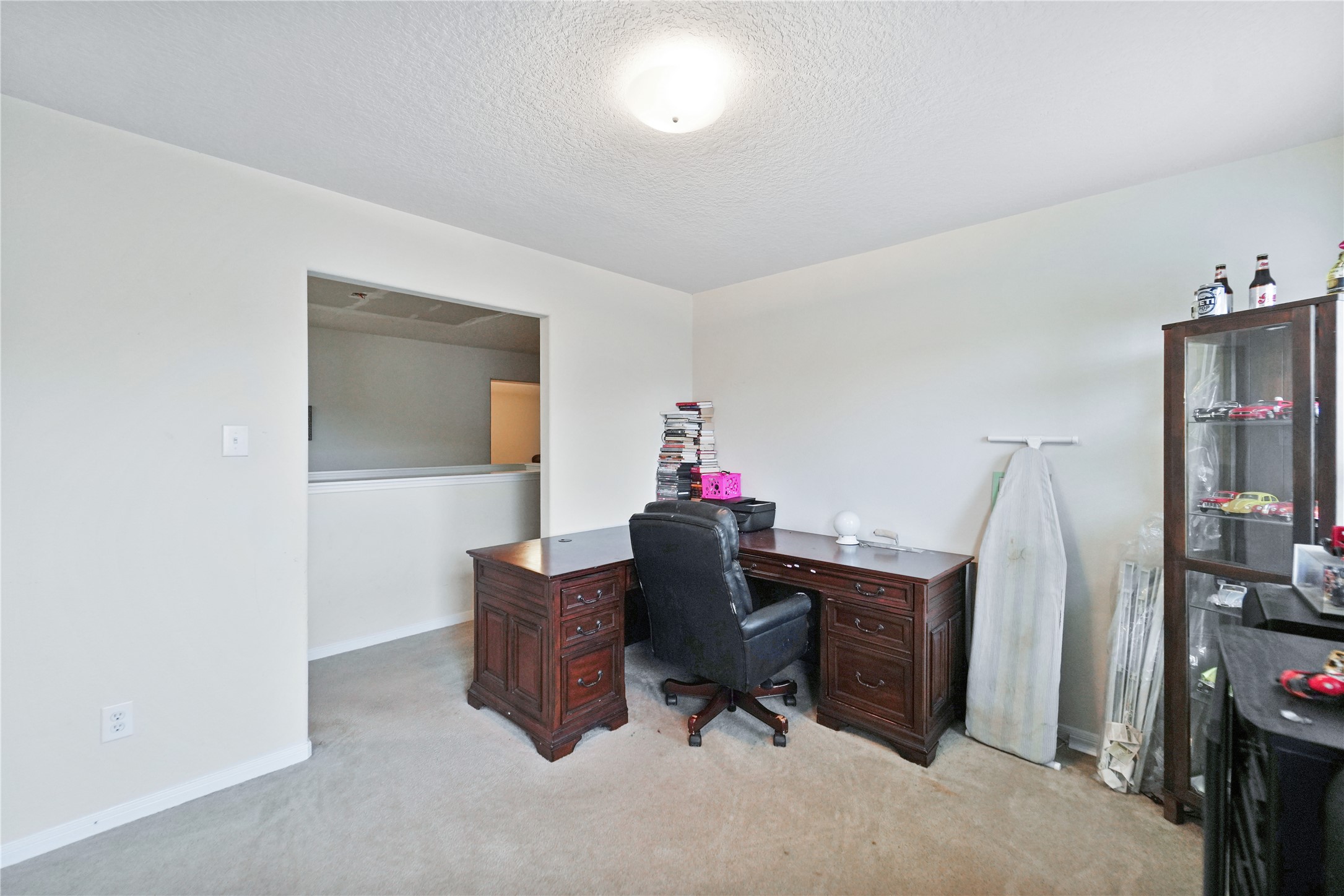 8011 Sumal Circle Baytown, TX 77521 - Photo 35 of 37 a workspace with furniture and a chandelier