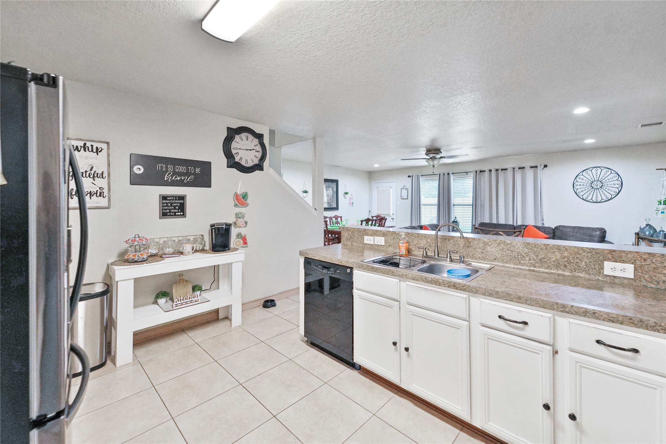 8011 Sumal Circle Baytown, TX 77521 - Photo 9 of 37 a kitchen with cabinets and window
