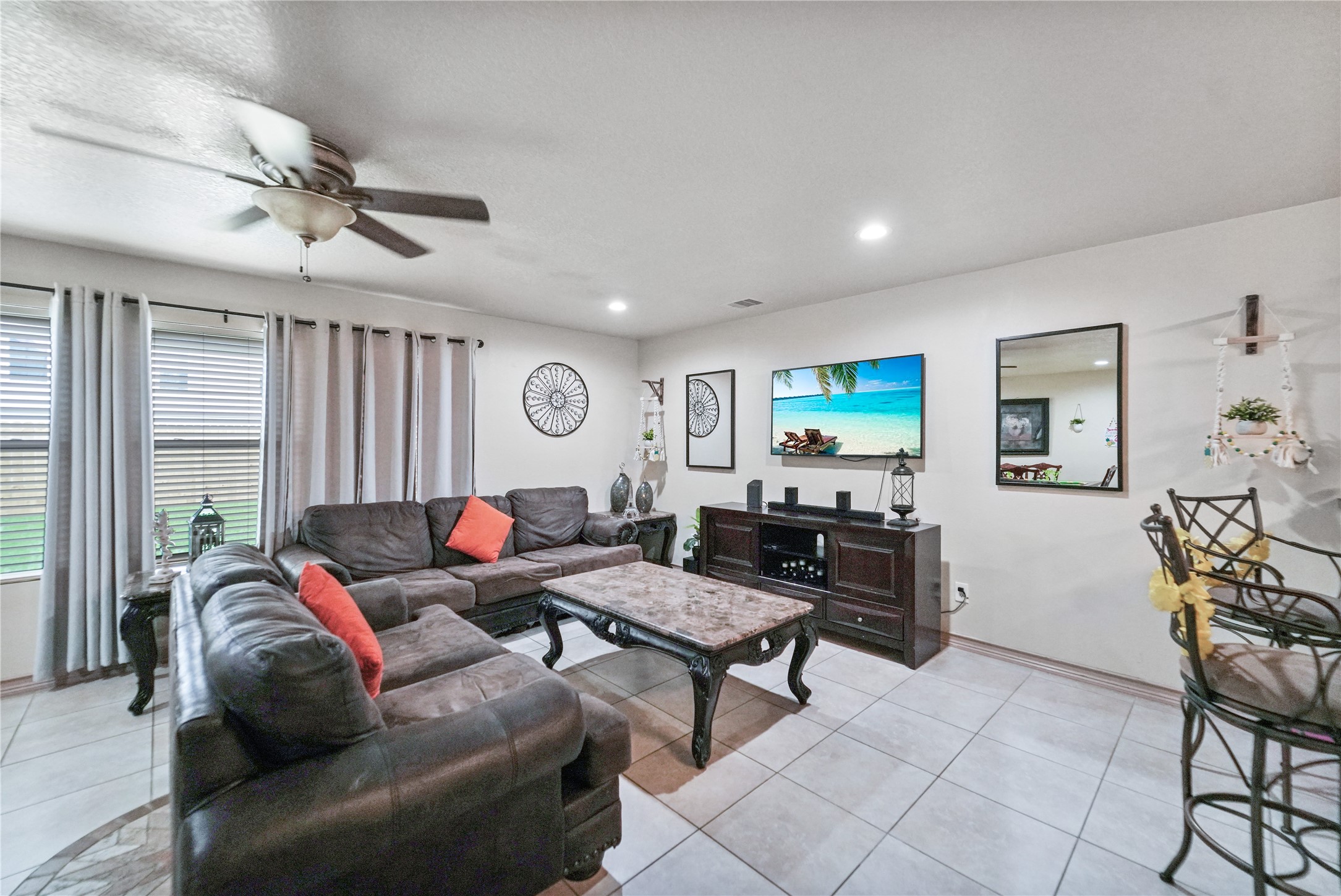 8011 Sumal Circle Baytown, TX 77521 - Photo 10 of 37 a living room with furniture and a flat screen tv