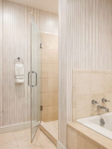 a bathroom with a sink and a shower