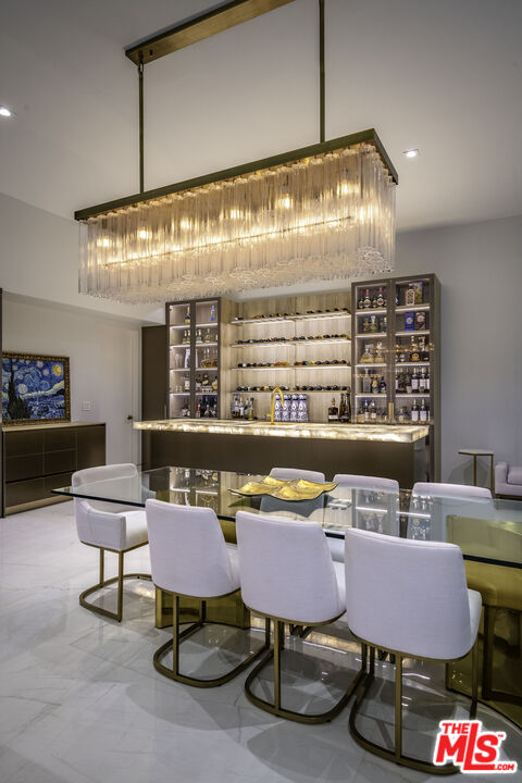 16601 Park Ln Circle Los Angeles, CA 90049 - Photo 57 of 69 a room with furniture