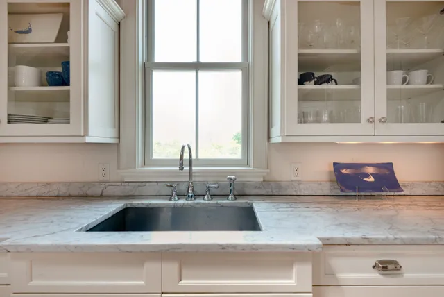 a kitchen sink with a window