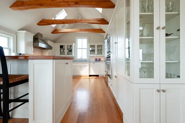 a view of a kitchen from the hallway