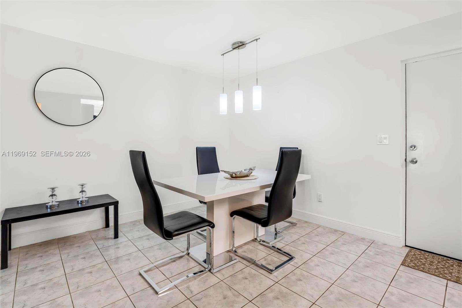 8501 Northwest 8th Street, Unit 110 Miami, FL 33126 - Photo 17 of 21 a view of a workspace with furniture