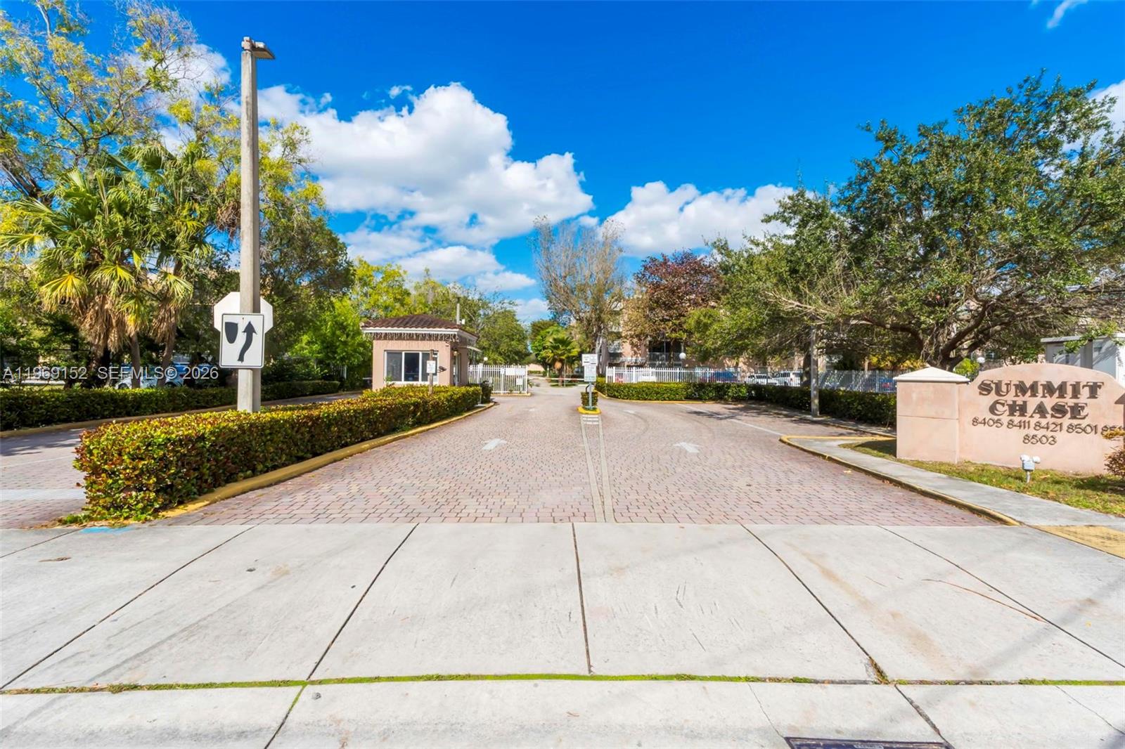 8501 Northwest 8th Street, Unit 110 Miami, FL 33126 - Photo 2 of 21 a view of a street with houses
