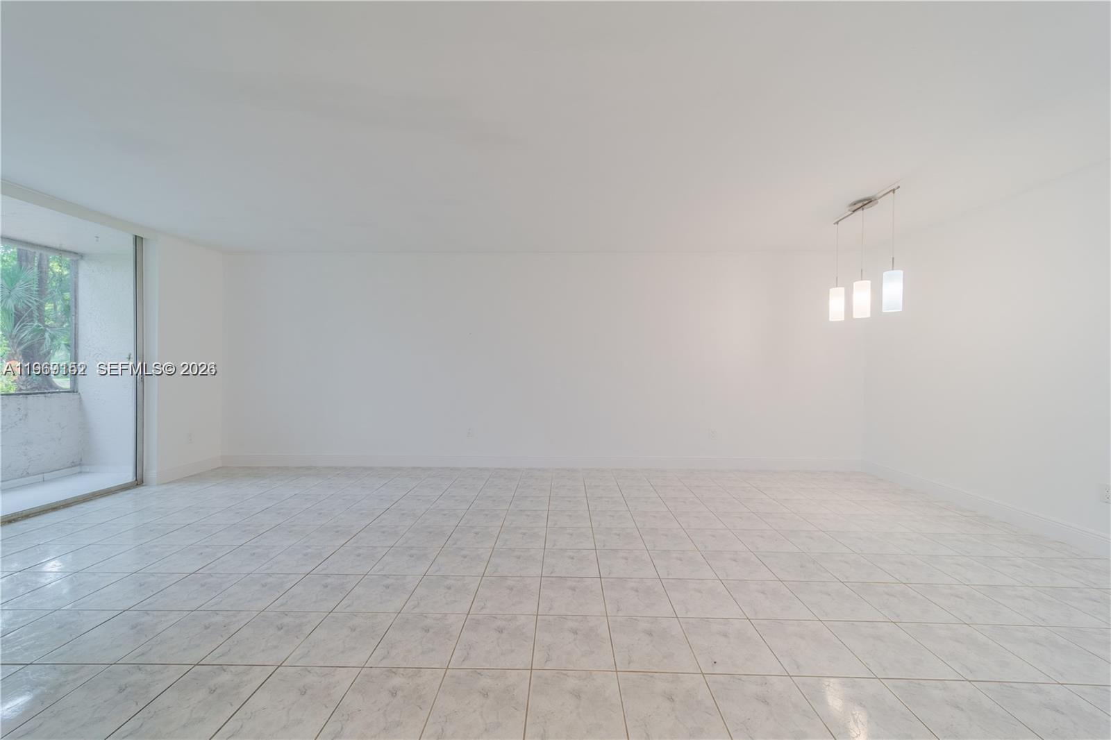 8501 Northwest 8th Street, Unit 110 Miami, FL 33126 - Photo 6 of 21 wooden floor in a empty room