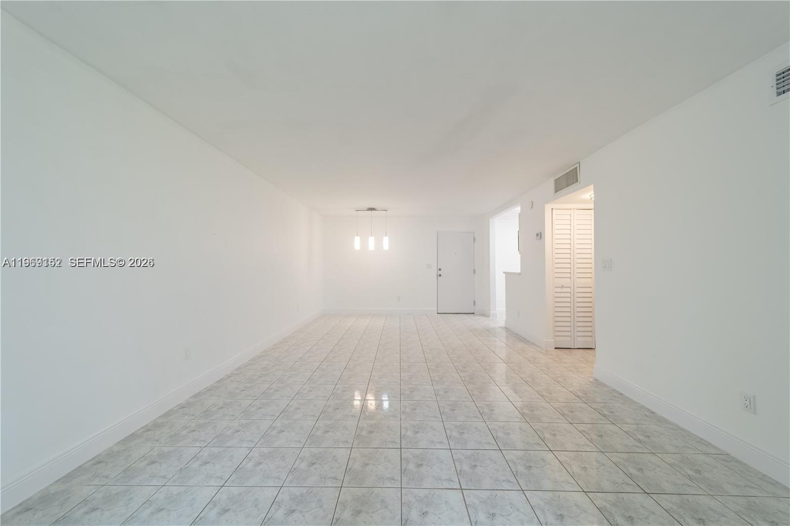 8501 Northwest 8th Street, Unit 110 Miami, FL 33126 - Photo 7 of 21 a view of an empty room