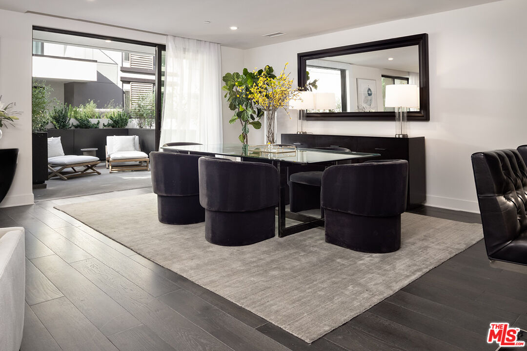 411 South Hamel Road, Unit 205 Los Angeles, CA 90048 - Photo 3 of 17 a living room with granite countertop furniture and a potted plant