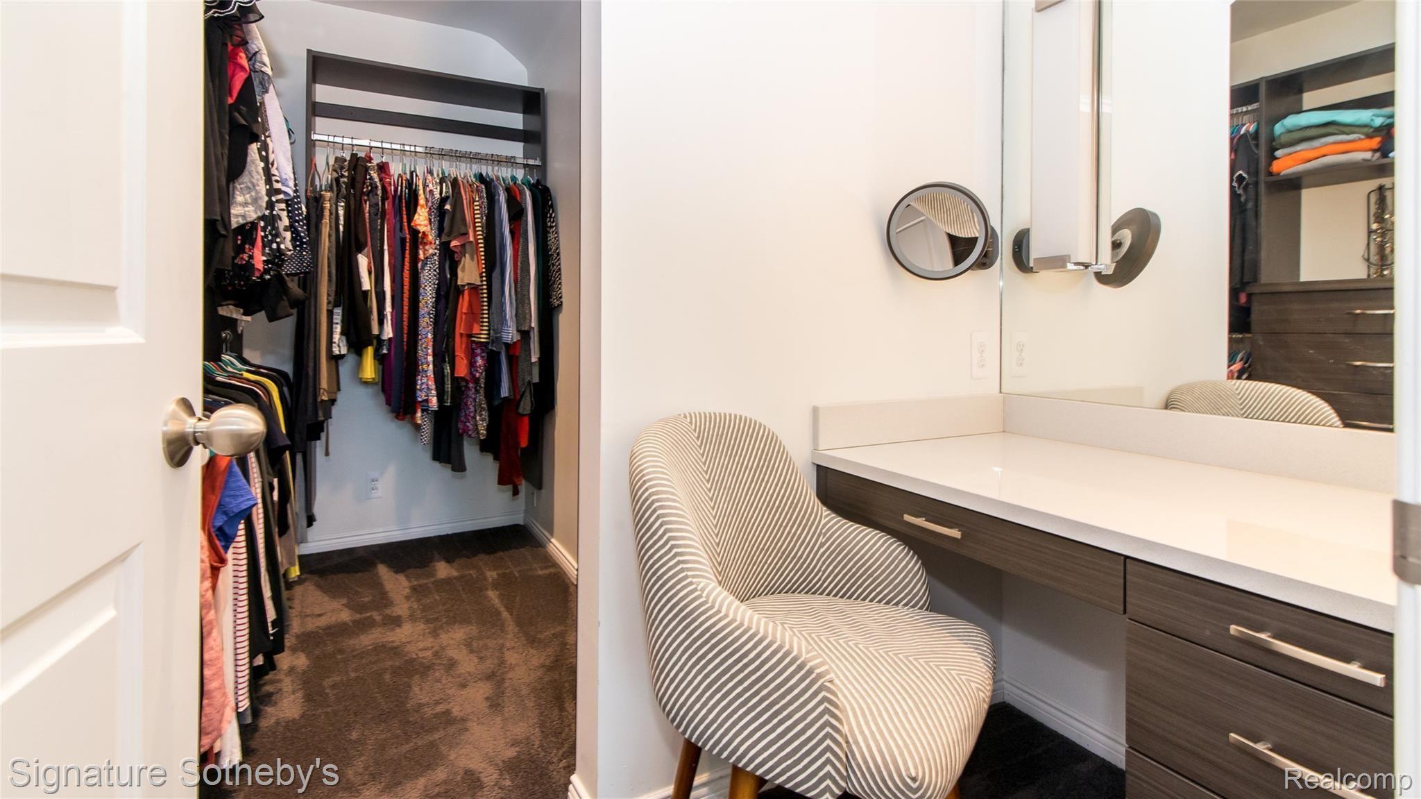 263 Ravine Road Birmingham, MI 48009 - Photo 29 of 79 034_35.jpg Ladies walk in Master closet and dressing table