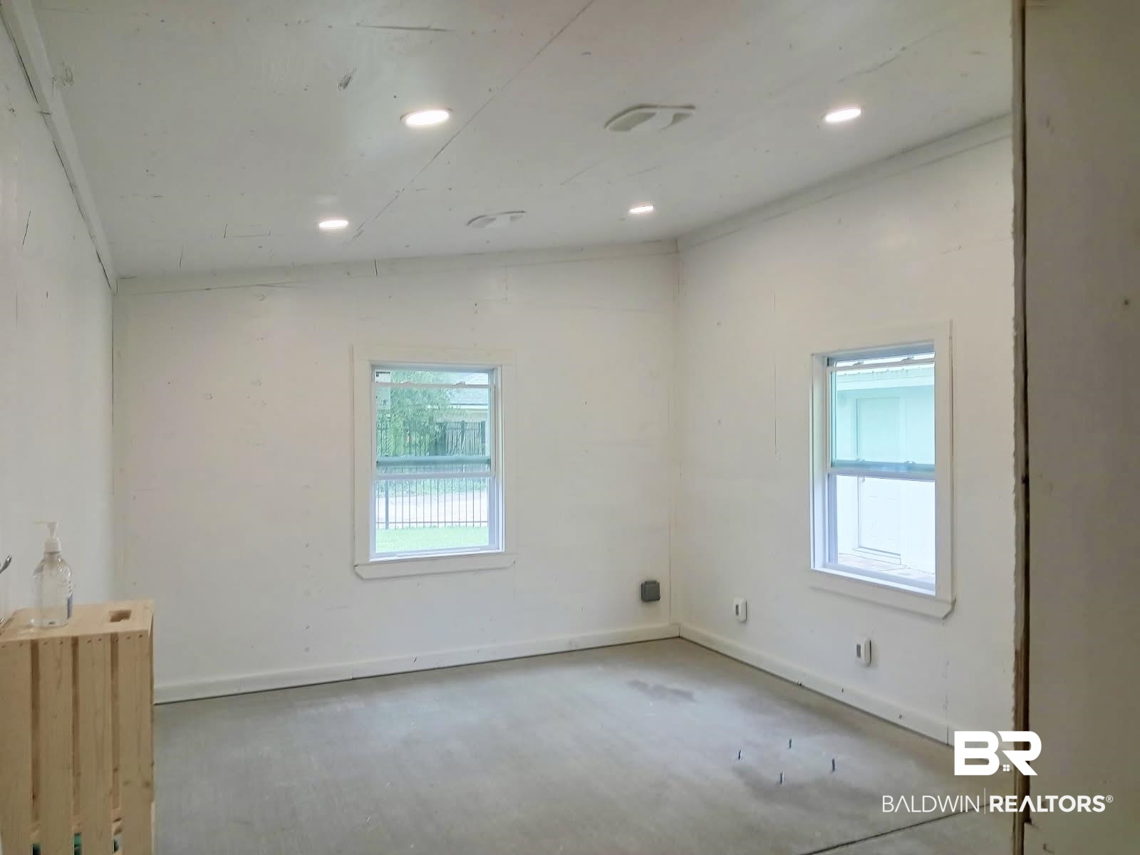 516 Juniper Place Drive Foley, AL 36535 - Photo 49 of 51 Spare room featuring recessed lighting and concrete flooring