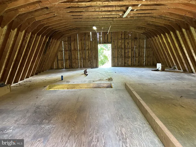 a view of a backyard of the house