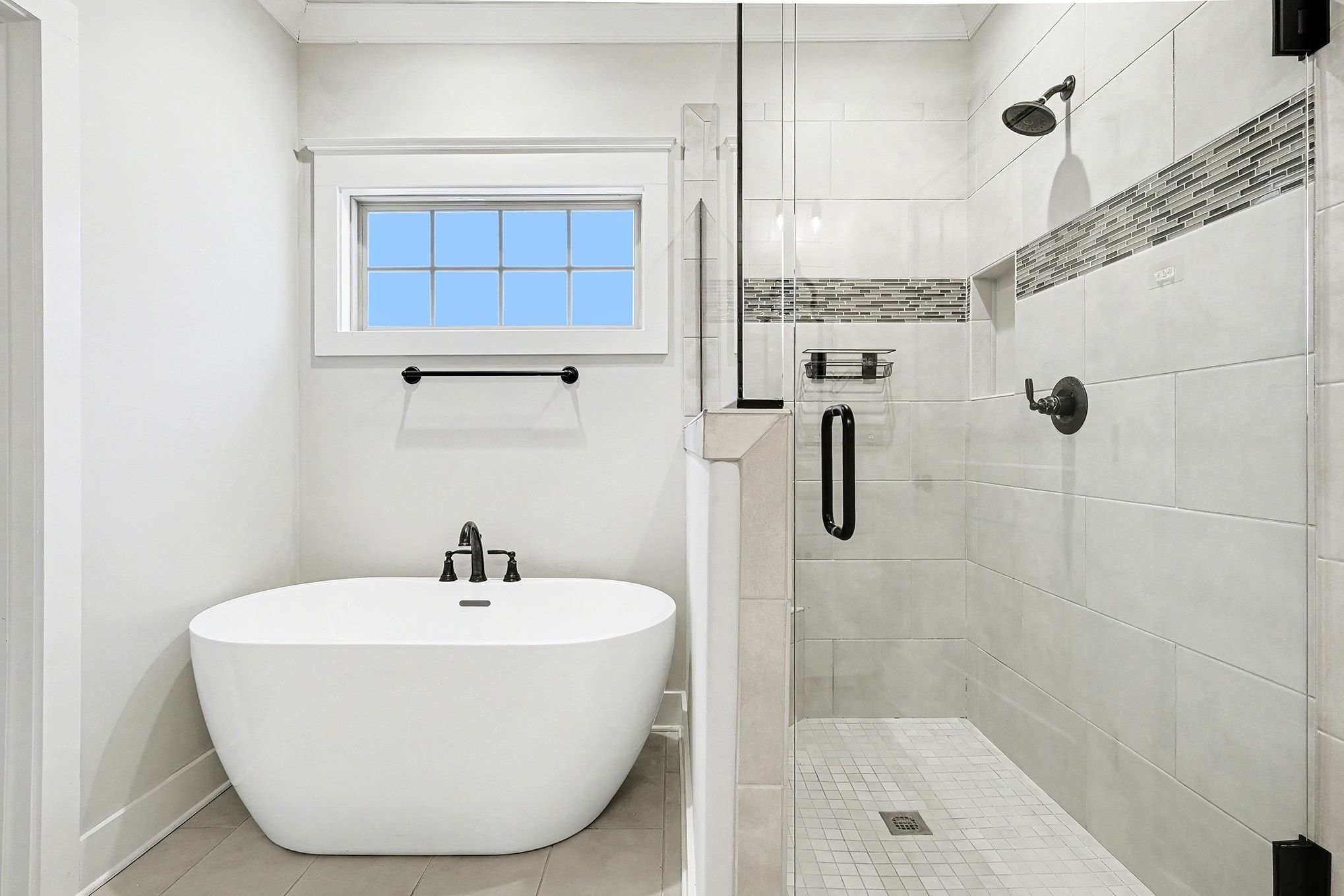 3008 Turnstone Trace Spring Hill, TN 37174 - Photo 18 of 30 a bathroom with a sink a glass door shower and mirror