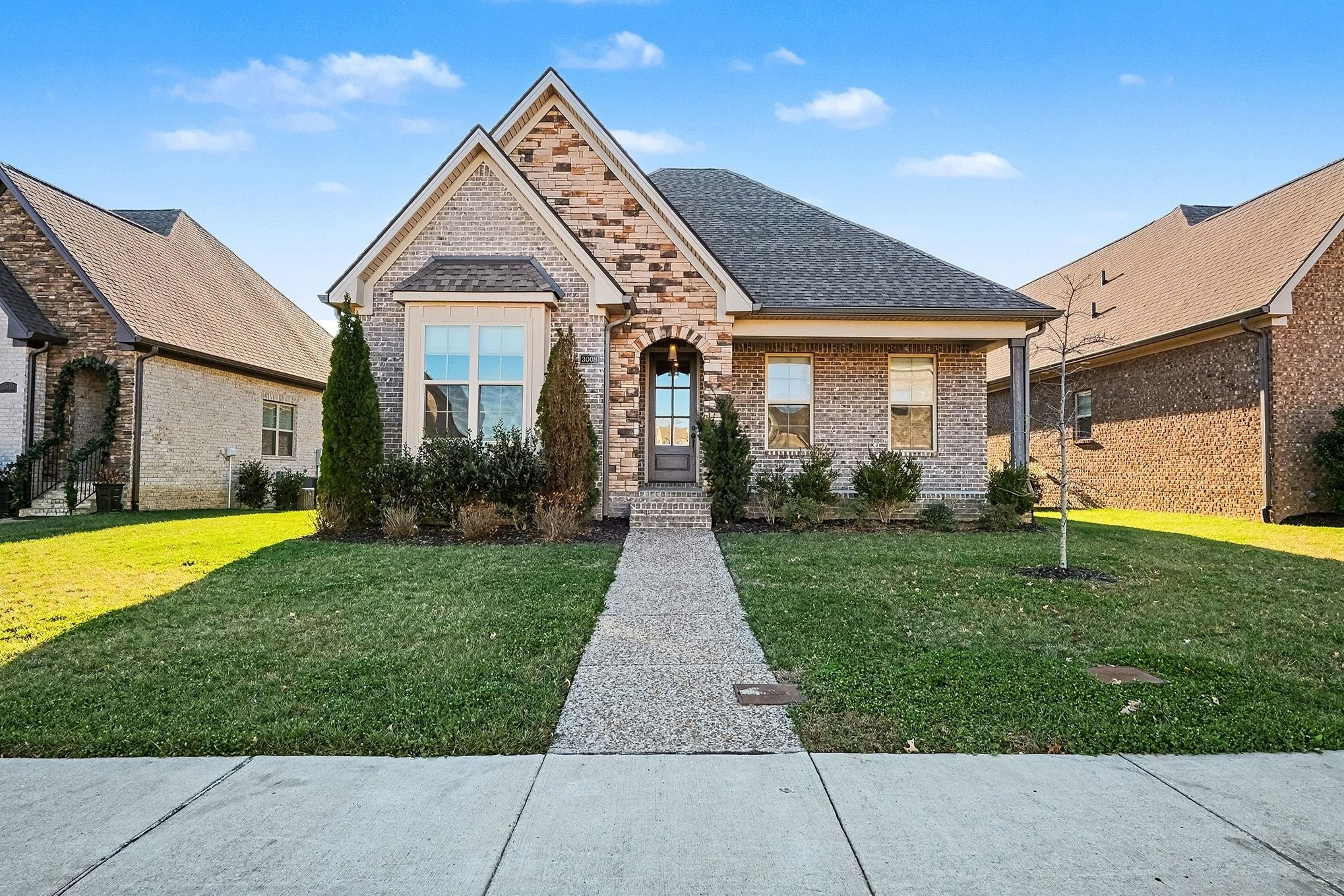 3008 Turnstone Trace Spring Hill, TN 37174 - Photo 2 of 30 a front view of house with yard and green space